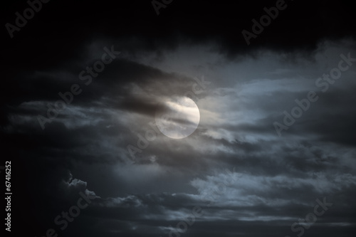 Overcast full moon night
