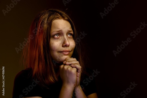 Teen girl praying
