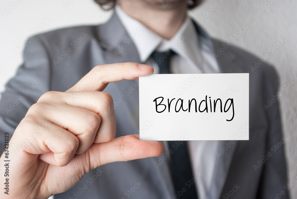 Branding. Businessman showing business card Branding. Businessman showing business card