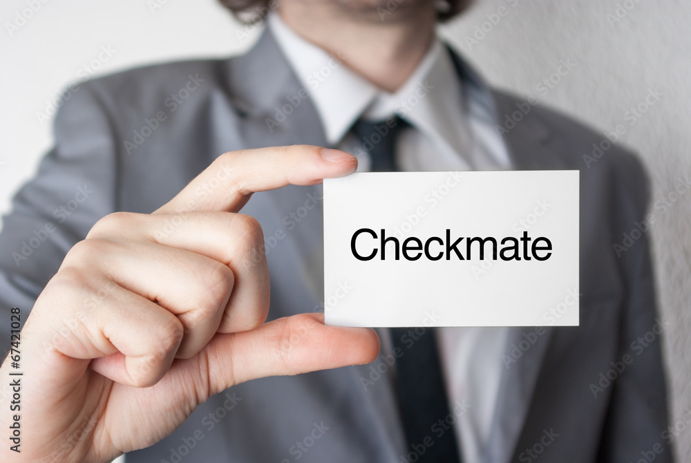 Checkmate. Businessman showing business card Checkmate. Businessman showing business card