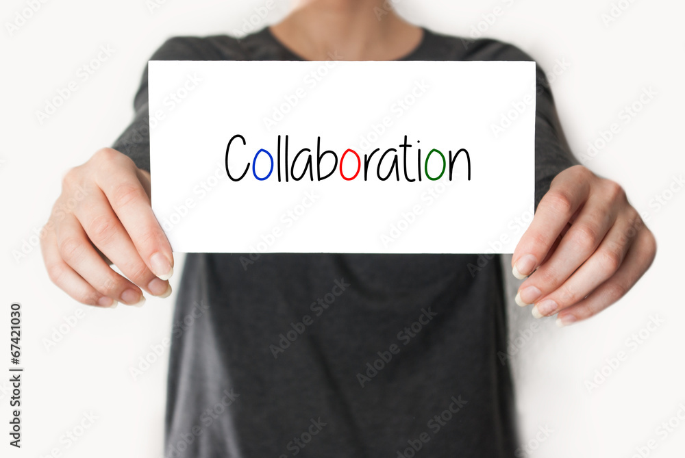Collaboration. female showing card Collaboration. female showing card
