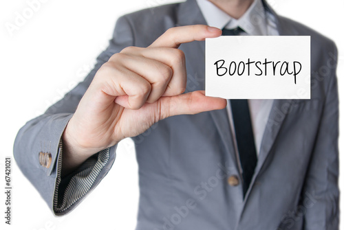 Bootstrap. Businessman holding business card photo