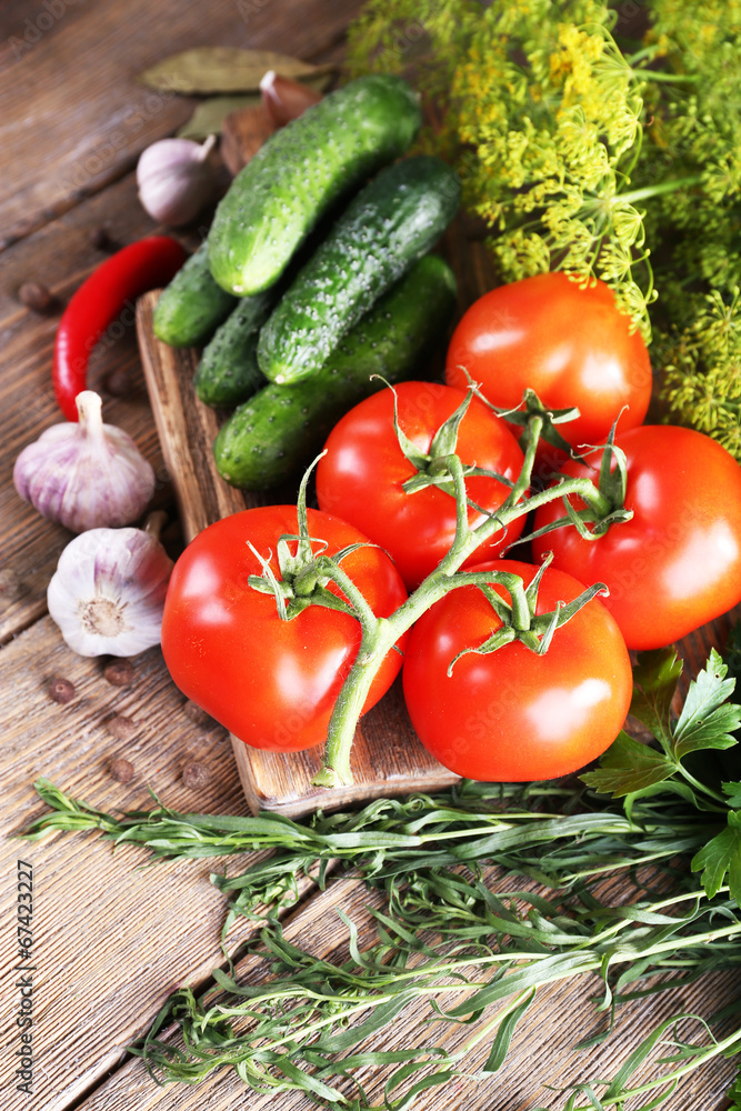 Fresh vegetables with herbs and spices on table, close-up Fresh vegetables with herbs and spices on table, close-up
