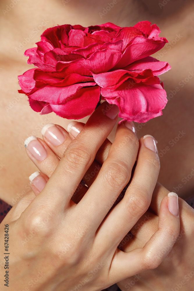Fototapeta premium Hands with flower