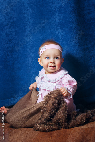 Cute little girl in pink dress photo