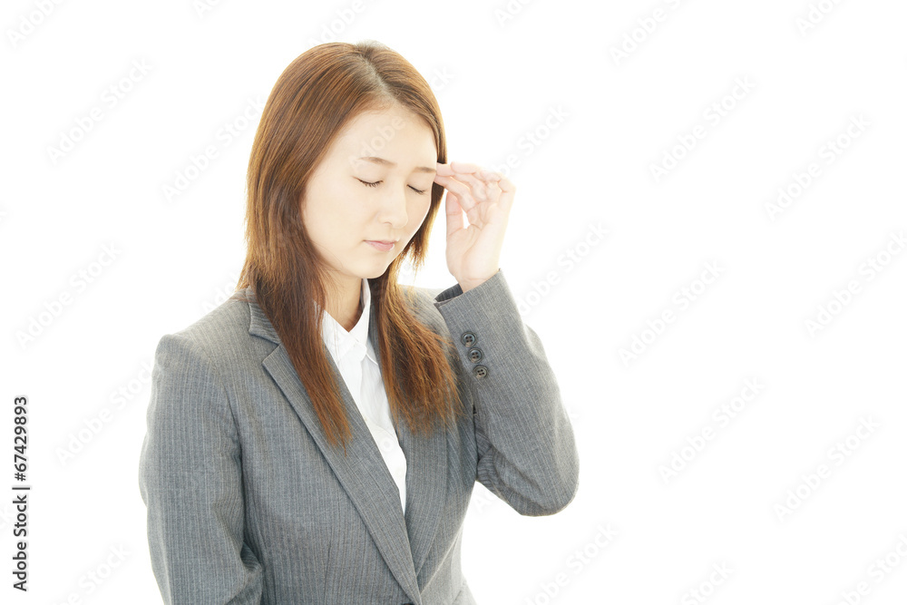頭痛に悩むOL 頭痛に悩むOL