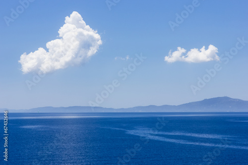 Beautiful background from sea, sky and clouds © happyimages