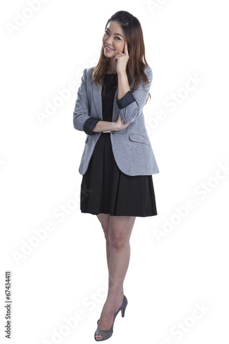 thinking business woman standing
