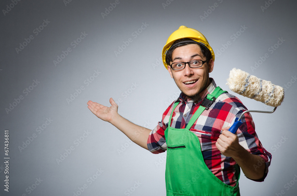 Funny painter with hardhat and roller Funny painter with hardhat and roller
