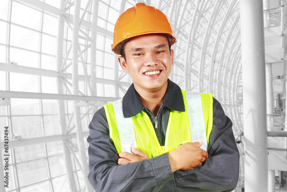 Portrait of construction engineer with pipe line modern building Portrait of construction engineer with pipe line modern building