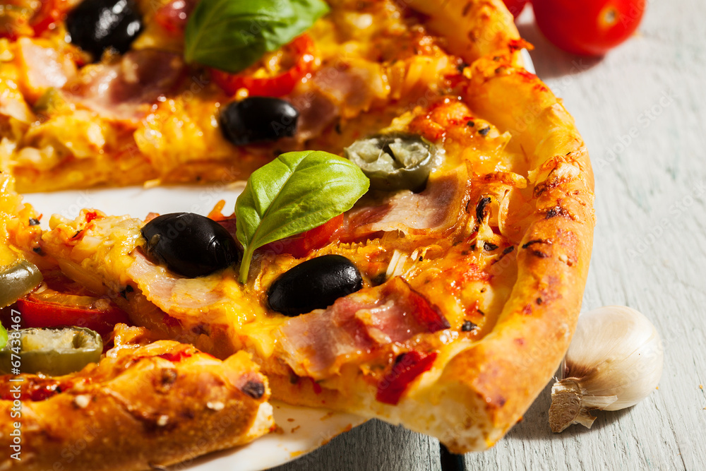 Pizza with bacon, olives and jalapeno pepper Pizza with bacon, olives and jalapeno pepper