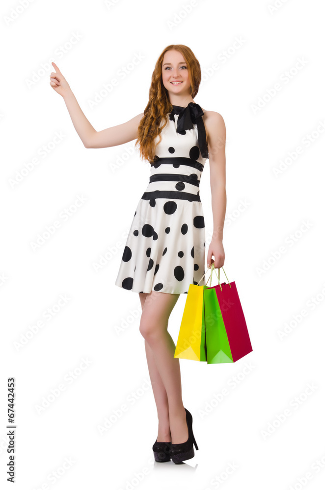 Woman with shopping bags isolated on white Woman with shopping bags isolated on white