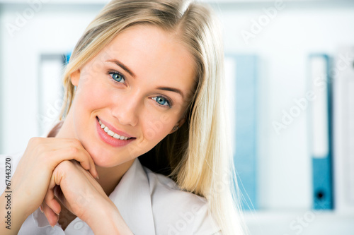 Close up portrait of smiling business woman