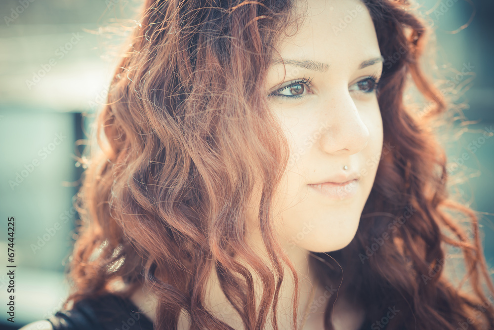 young beautiful hipster woman with red curly hair young beautiful hipster woman with red curly hair