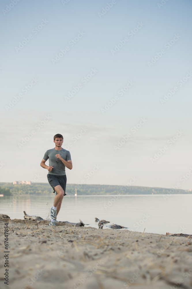 Male running beach
