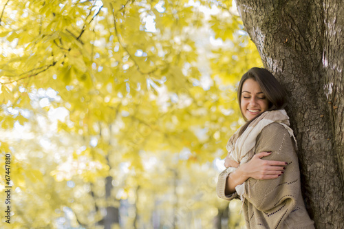 Young woman at autumn forest © BGStock72