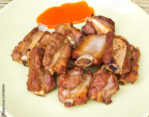 Bild auf Leinwand Fried spareribs and chili Sauce with garlic pepper