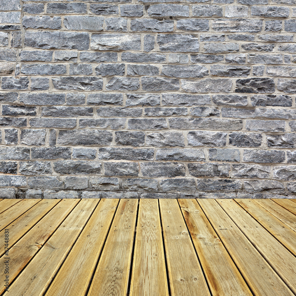 Wooden deck floor and brick wall