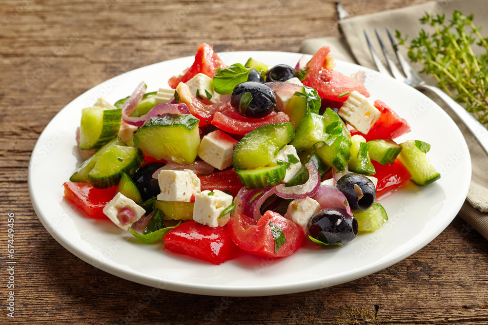 fresh vegetable salad with cheese and olives