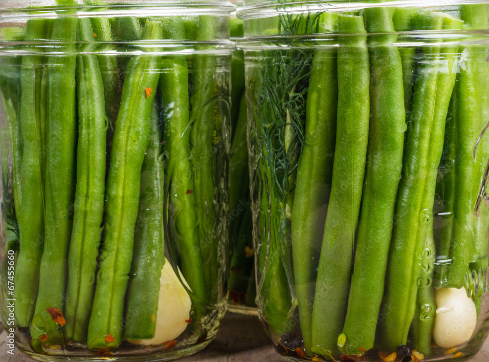 Fototapeta premium Jars of gren beans ready to preserve