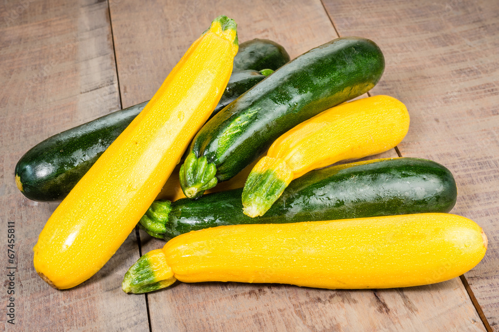 Zucchini and yellow squash on table Zucchini and yellow squash on table