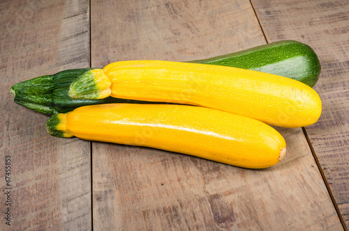Zucchini and yellow squash on table