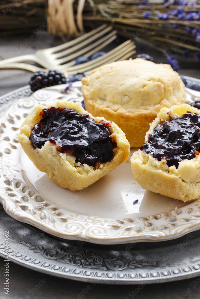 Muffins filled with blueberry and blackberry jam Muffins filled with blueberry and blackberry jam