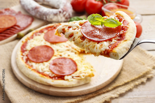 Italian cuisine: pizza with salami
