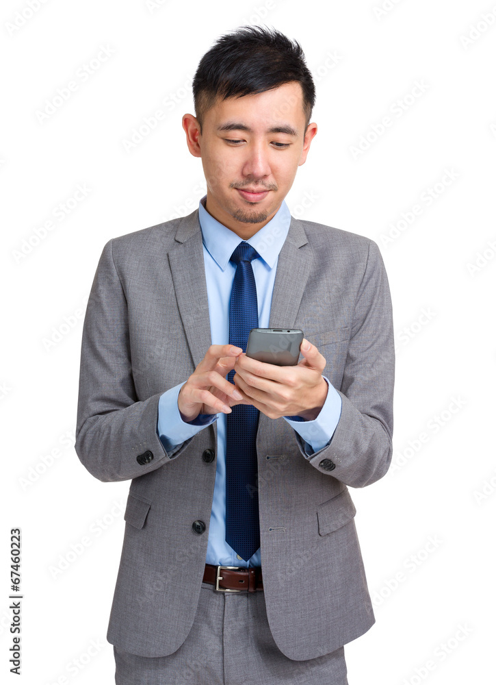 Asian man read the message on mobile phone Asian man read the message on mobile phone