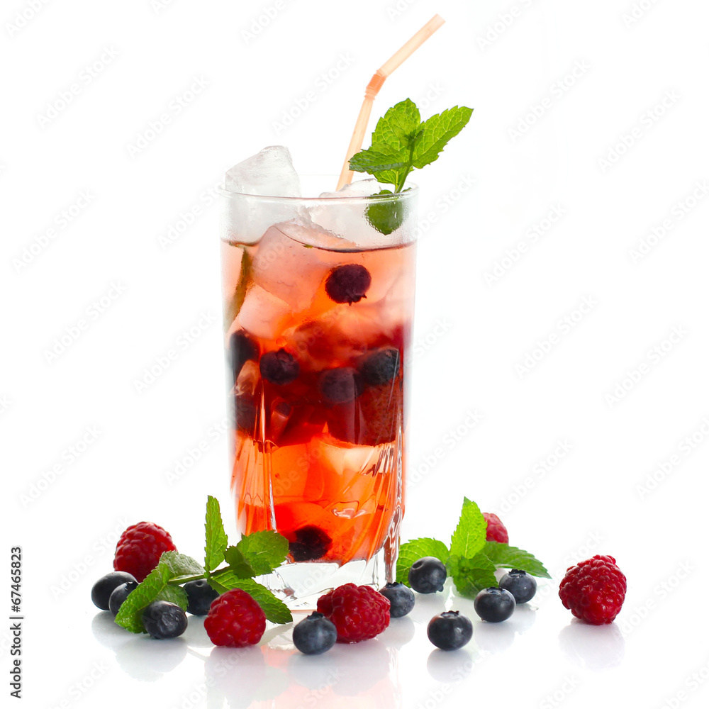 Juice from freshly harvested raspberries and blueberries on whit Juice from freshly harvested raspberries and blueberries on whit