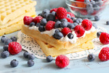 waffels with cream and berry fruits