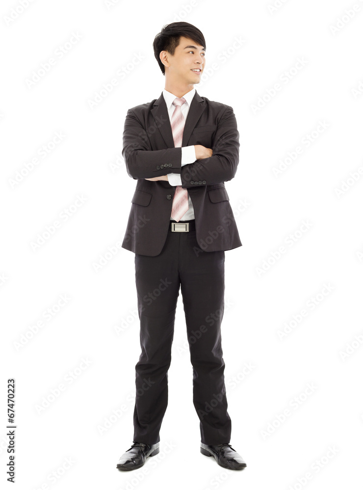 smiling businessman standing and crossed arms over white smiling businessman standing and crossed arms over white