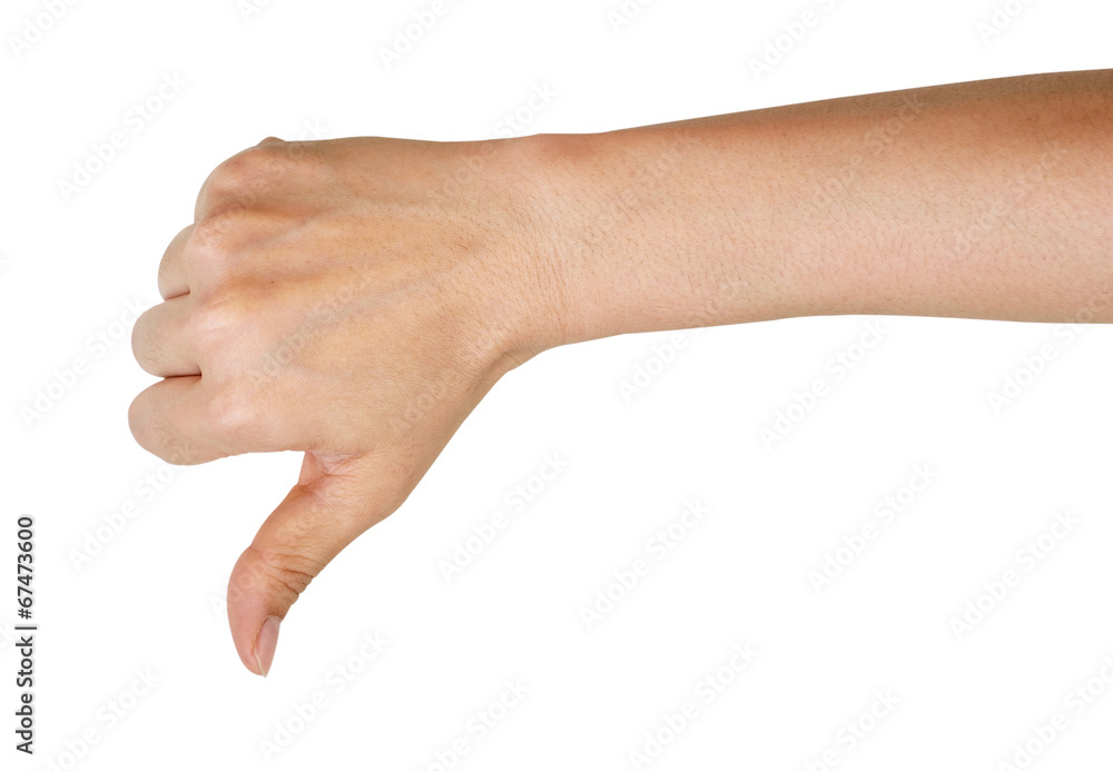 Female hand showing a thumbs down gesture. Isolated on white bac Female hand showing a thumbs down gesture. Isolated on white bac