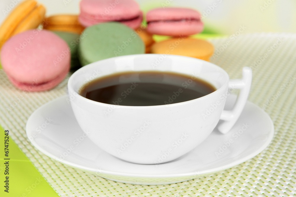 Coffee and macaroons on table close-up Coffee and macaroons on table close-up