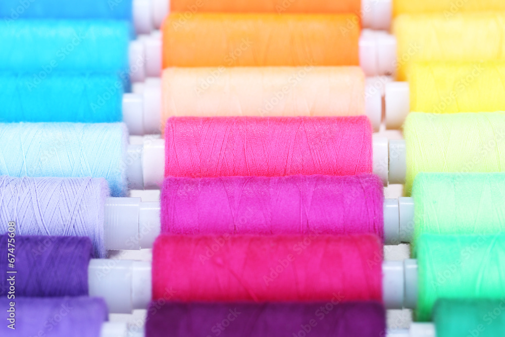 Multicolor sewing threads background Multicolor sewing threads background