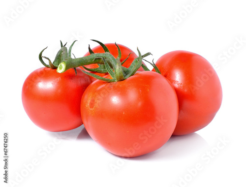 bunch of red tomatoes isolated on a white background