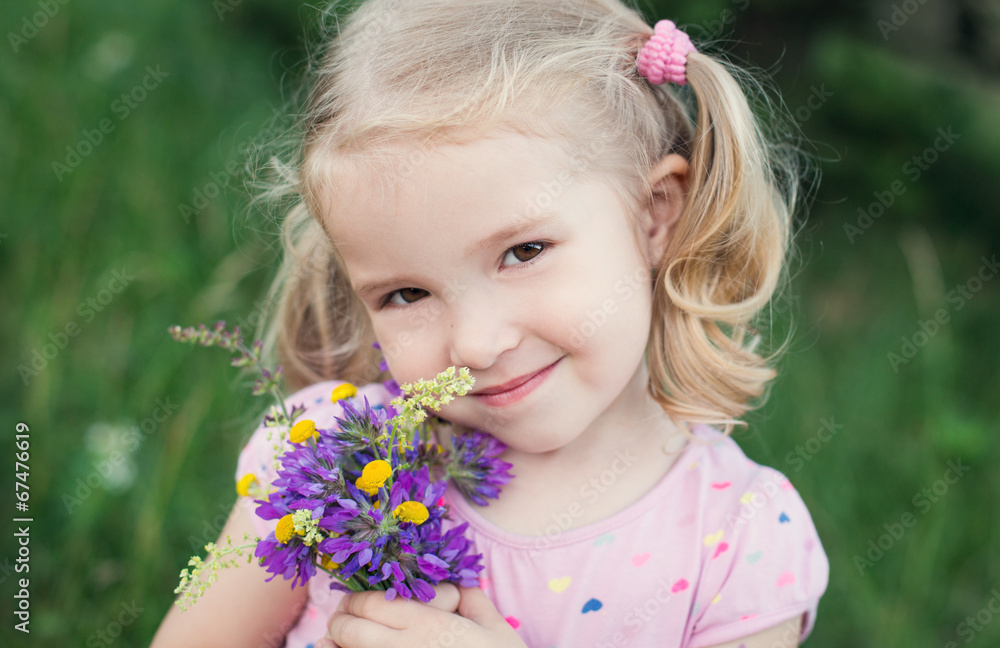cute little girl holding a bouquet cute little girl holding a bouquet