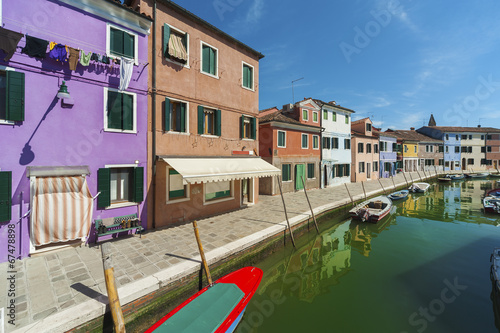 Canal in Burano island, Venice, Italy.