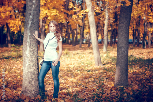 beautiful girl in the autumn park © filosofartphoto