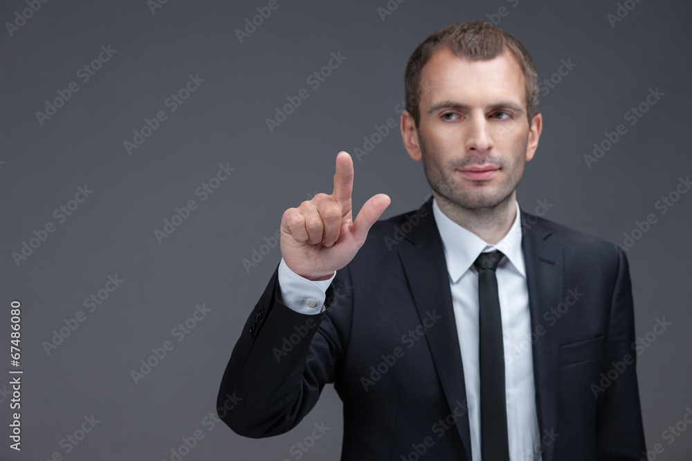 Portrait of executive pointing finger gestures, isolated Portrait of executive pointing finger gestures, isolated