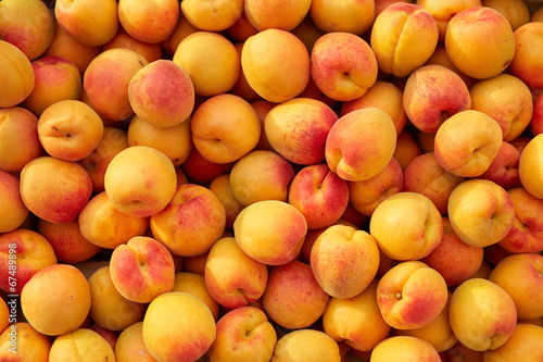 Valokuva Background of fresh apricots