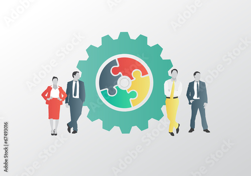 Business people with jigsaw cog