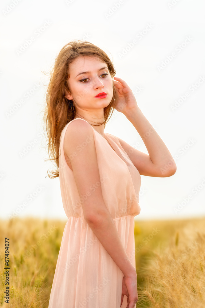 beautiful woman posing in wheat field beautiful woman posing in wheat field