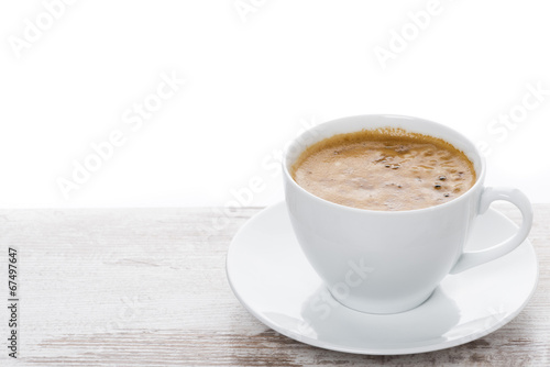 cup of espresso on a white table and space for text