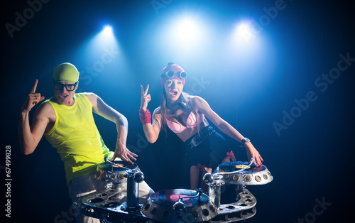 Two DJ on a blue background