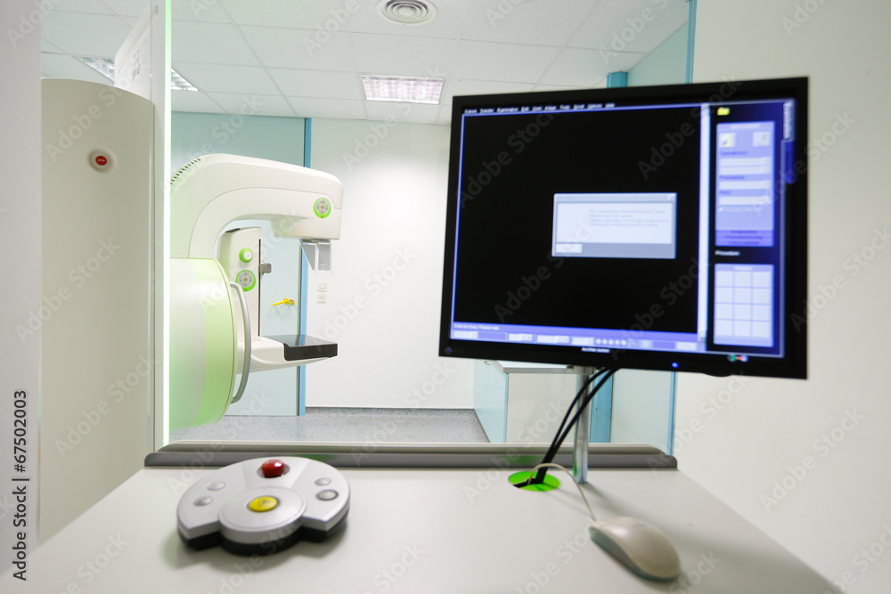 Mammography breast screening device in hospital laboratory. Mammography breast screening device in hospital laboratory.