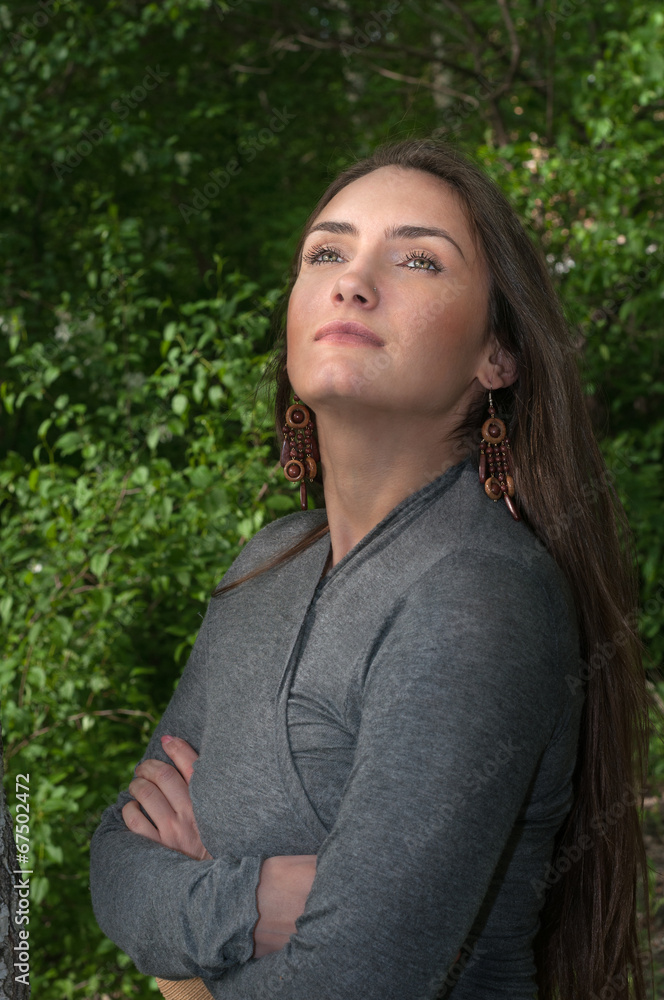 Portrait of a beautiful young brunette woman in summer Portrait of a beautiful young brunette woman in summer