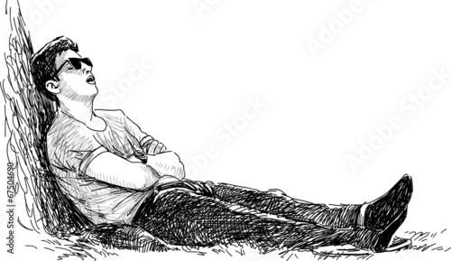 young man sleeping in the park