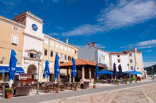 Panoramic view of clock tower and  Frane Petrica square in Cres photo