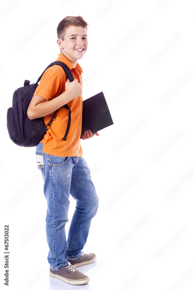 Portrait of a smiling school boy with backpack holding a noteboo Portrait of a smiling school boy with backpack holding a noteboo